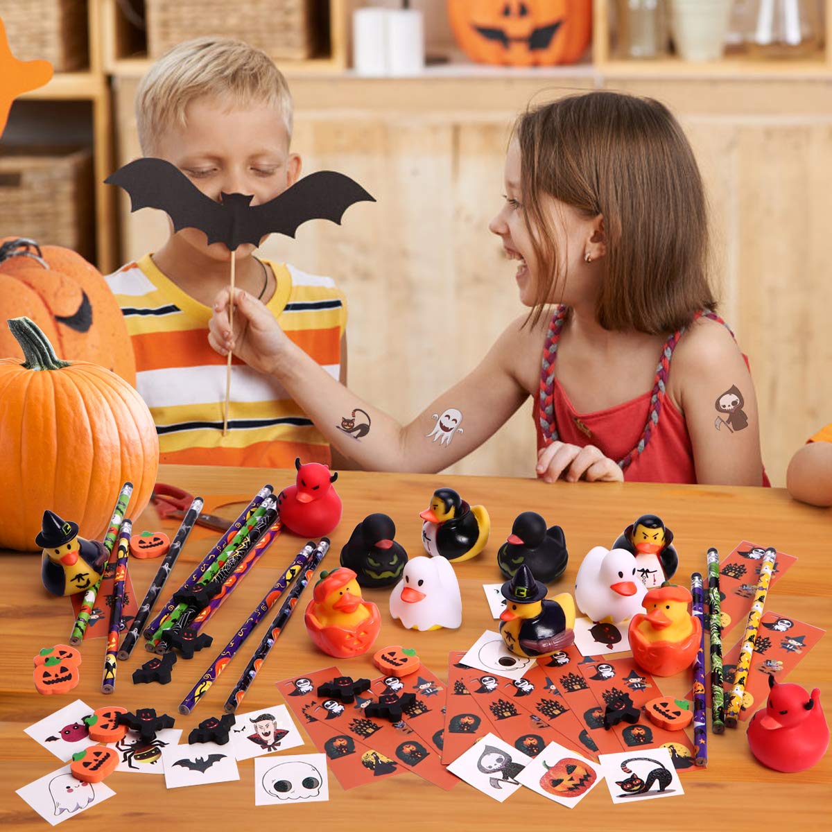 NEWBEA 156 Piece Halloween Party Favors Toys Assortment | 72 Halloween Glitter Tattoos | 48 Halloween Erasers | 12 Halloween Ducks | 12 Halloween Sticker Sheets | 12 Halloween Pencils